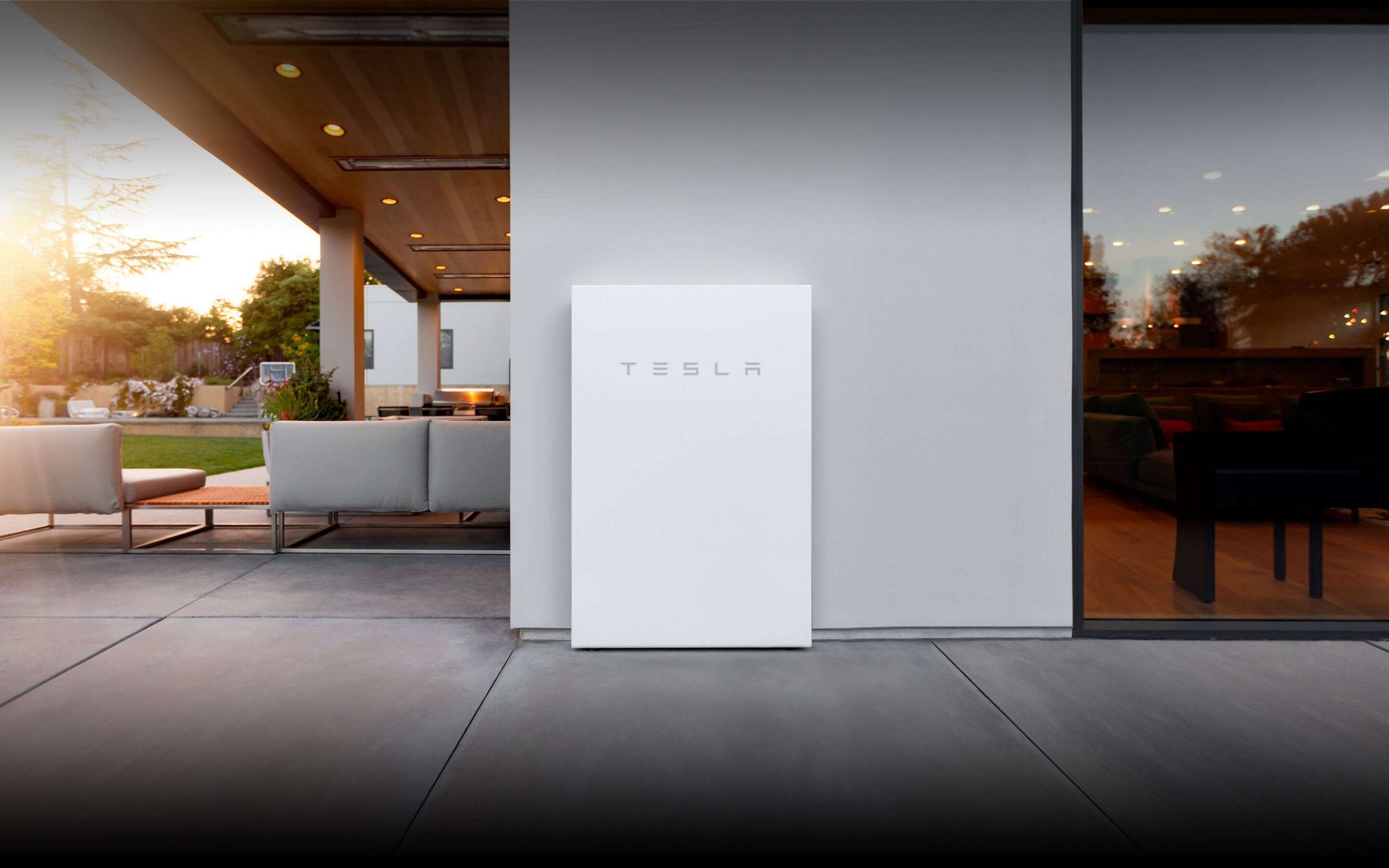 Tesla Powerwall on a premium home at sunset